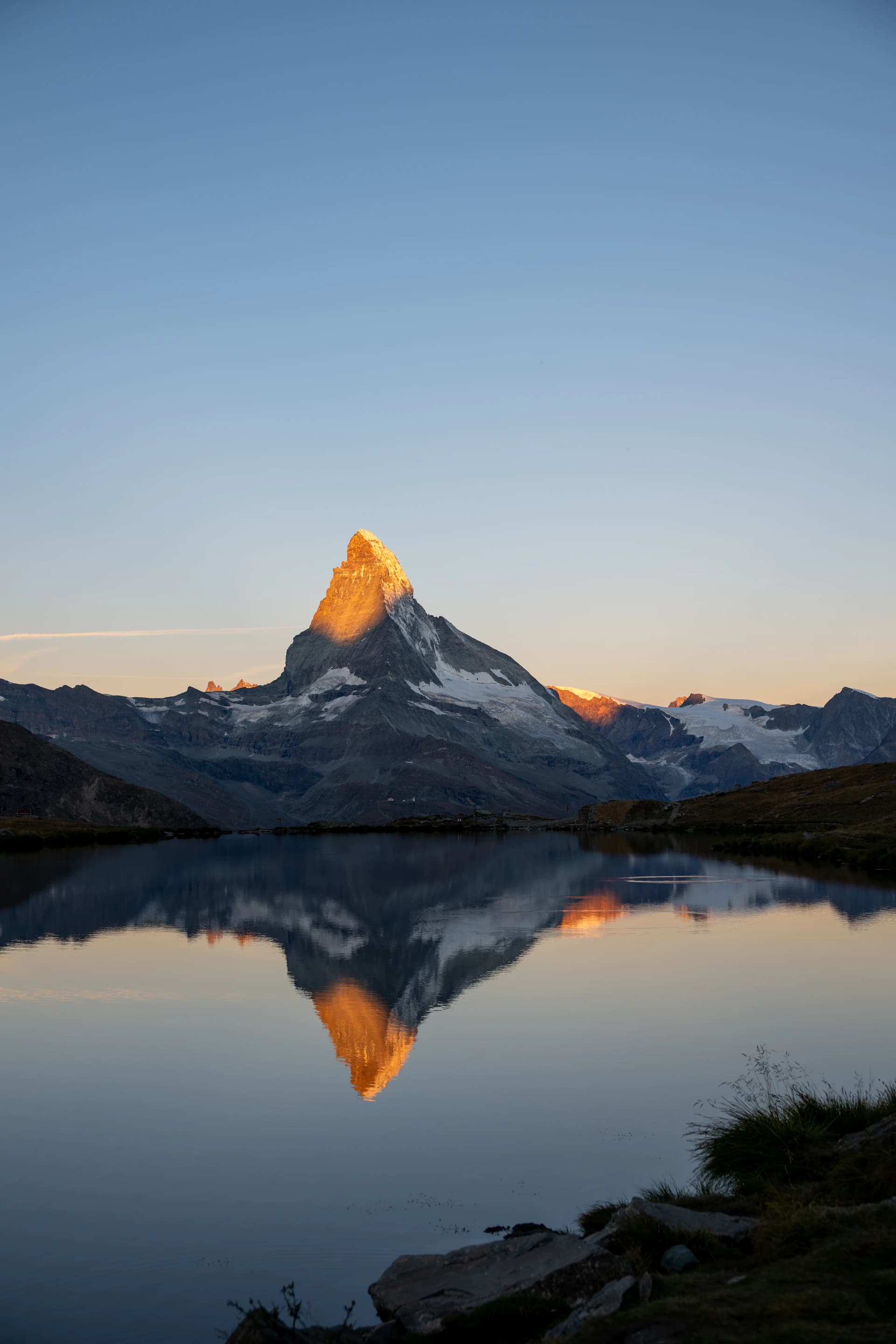 The Matterhorn above a still alpine lake